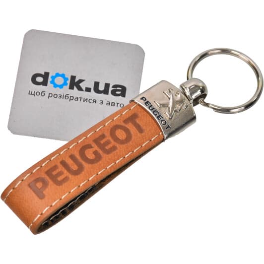 Брелок AutoTechteile з логотипом Peugeot коричневий PE4